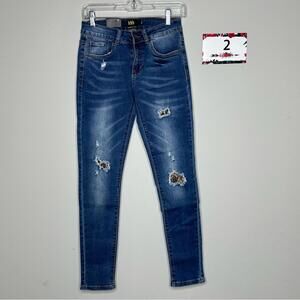 L&B size 2 mid rise skinny jeans  leopard print patch denim